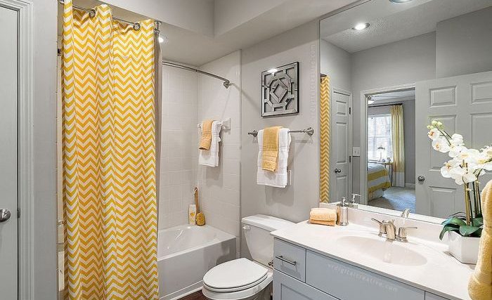 Yellow and grey bathroom decor